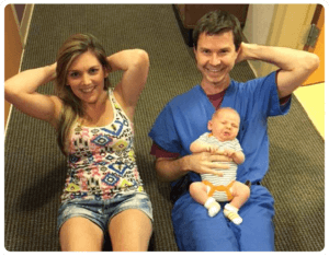 Dr Crigler doing situps with patient photo