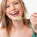 woman-eating-fruit-salad