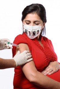 pregnant woman getting flu shot