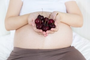 pregnant woman with fruit