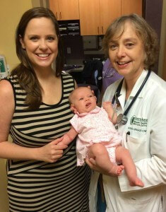Susan Griggs APRN, CNM with mom and baby photo