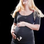 pregnant woman laughing