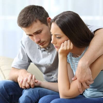 sad couple after miscarriage