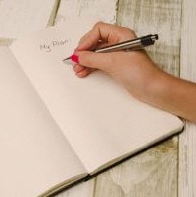 person writing resolutions
