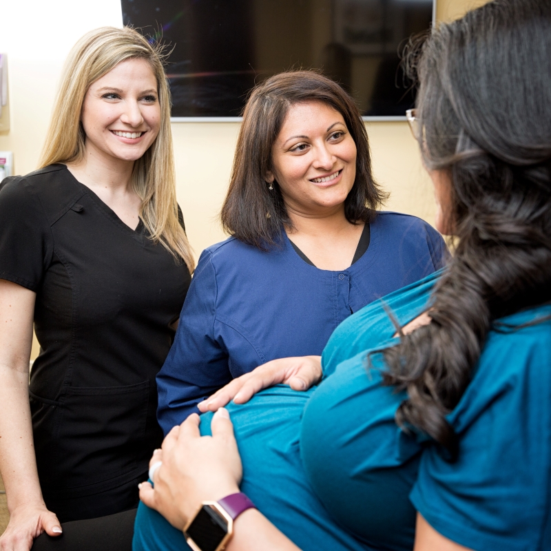 Gandhi and Jourdan with pregnant patient photo