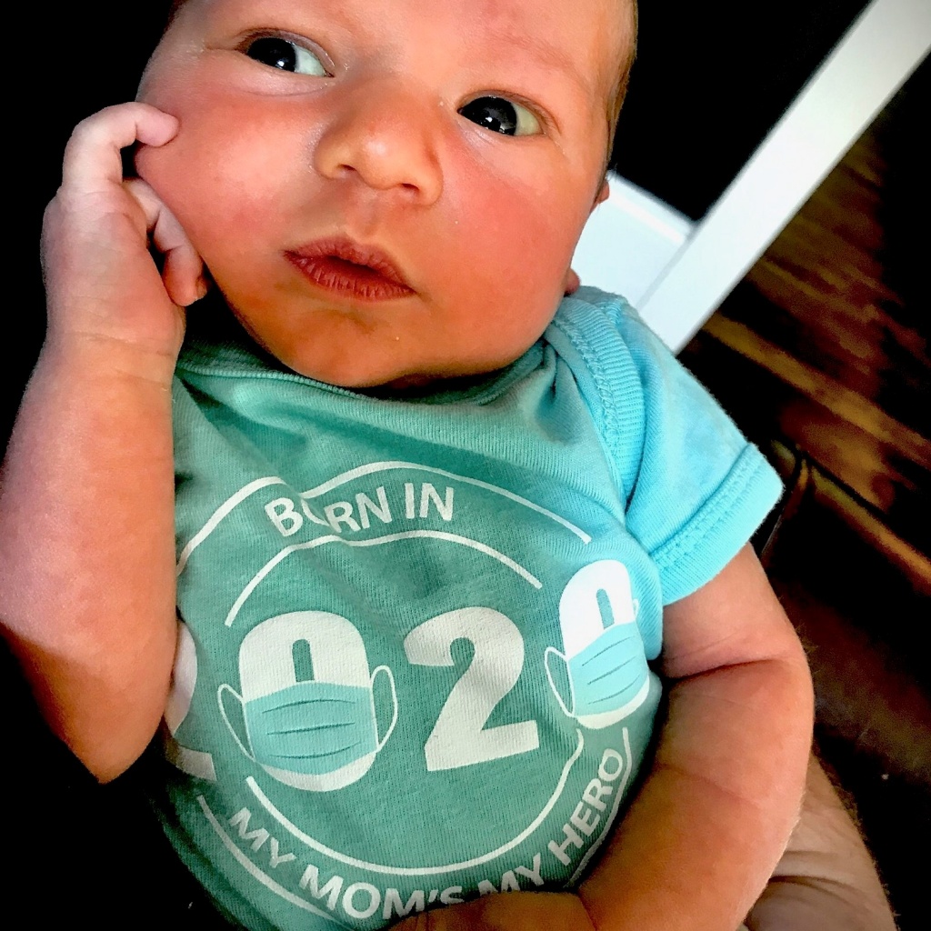 Maverick newborn onesie photo