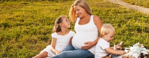 photo of pregnant woman and children for OB services