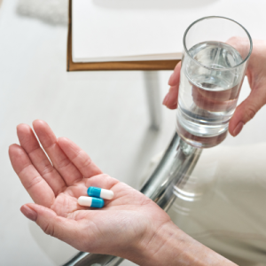 woman taking medication