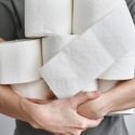 woman holding toilet paper